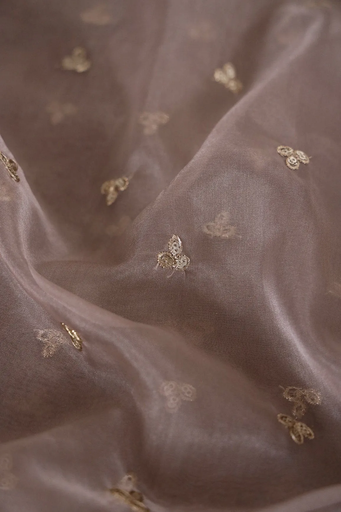 Gold Sequins With Gold Zari Small Leafy Motif Embroidery Work On Brown Organza Fabric