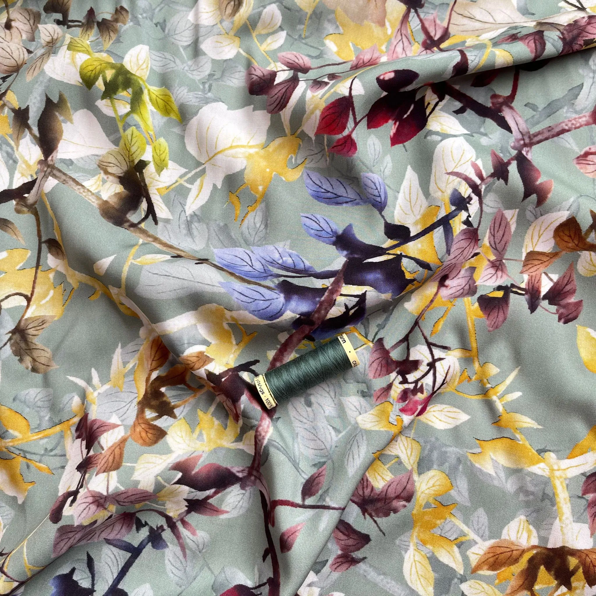 Hazy Foliage on Sage Green Viscose Fabric