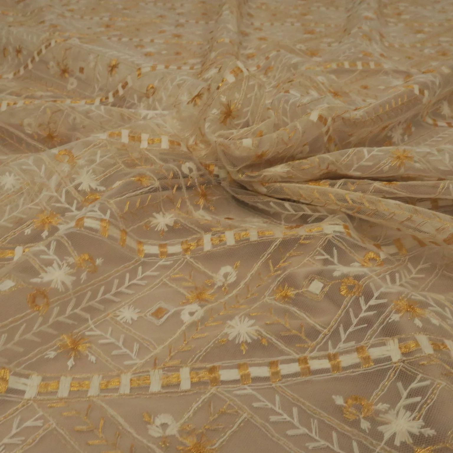 White Tulle With Gold and White Snowflake Design Embroidered Fabric